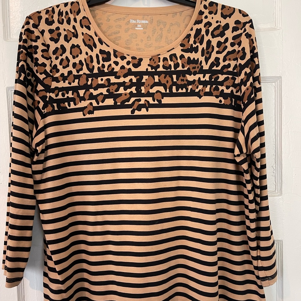 3/4 length carmel color with brown strips knit shirt.